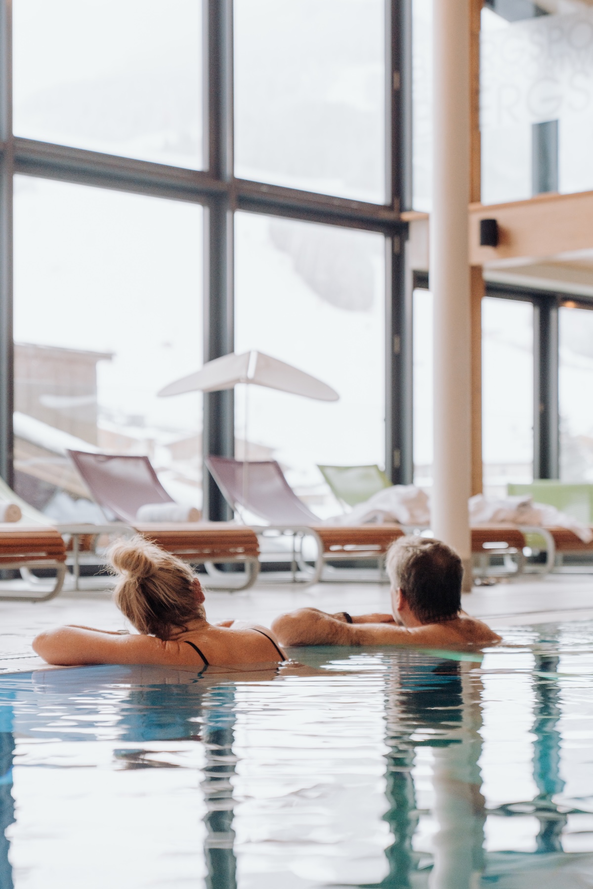 Relaxing in the pool at Glemmtalerhof, surrounded by winter views of Glemmtal. Peaceful and serene atmosphere.