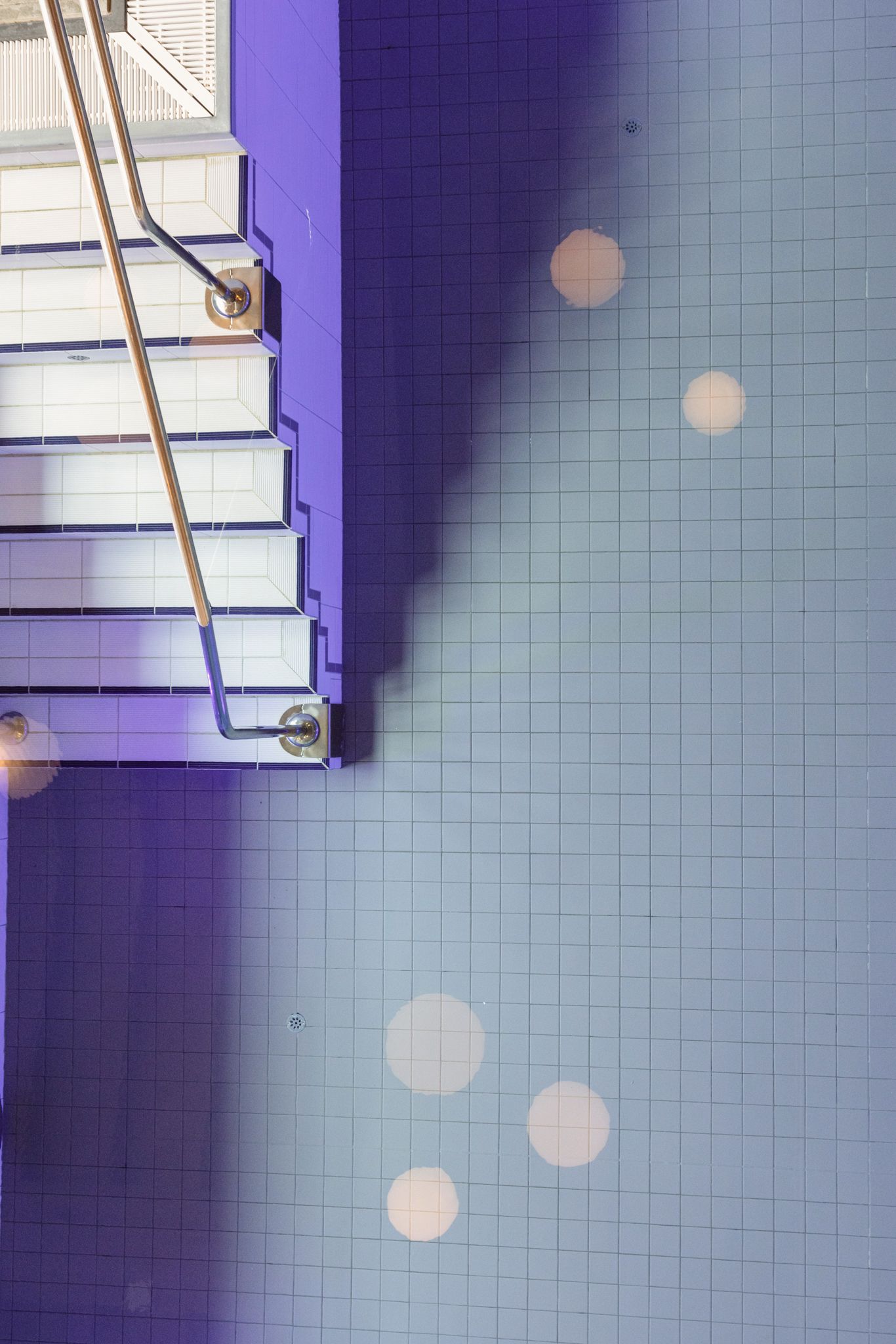 Shimmering pool in Glemmtalerhof, with beautiful tiles and atmospheric light.