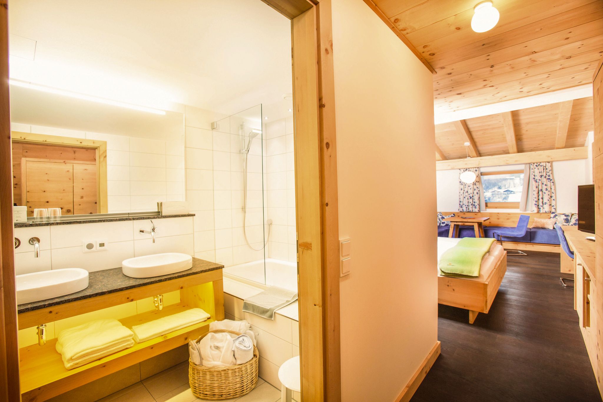 Modern amenities in Glemmtalerhof in Hinterglemm, view of cozy room and bathroom.