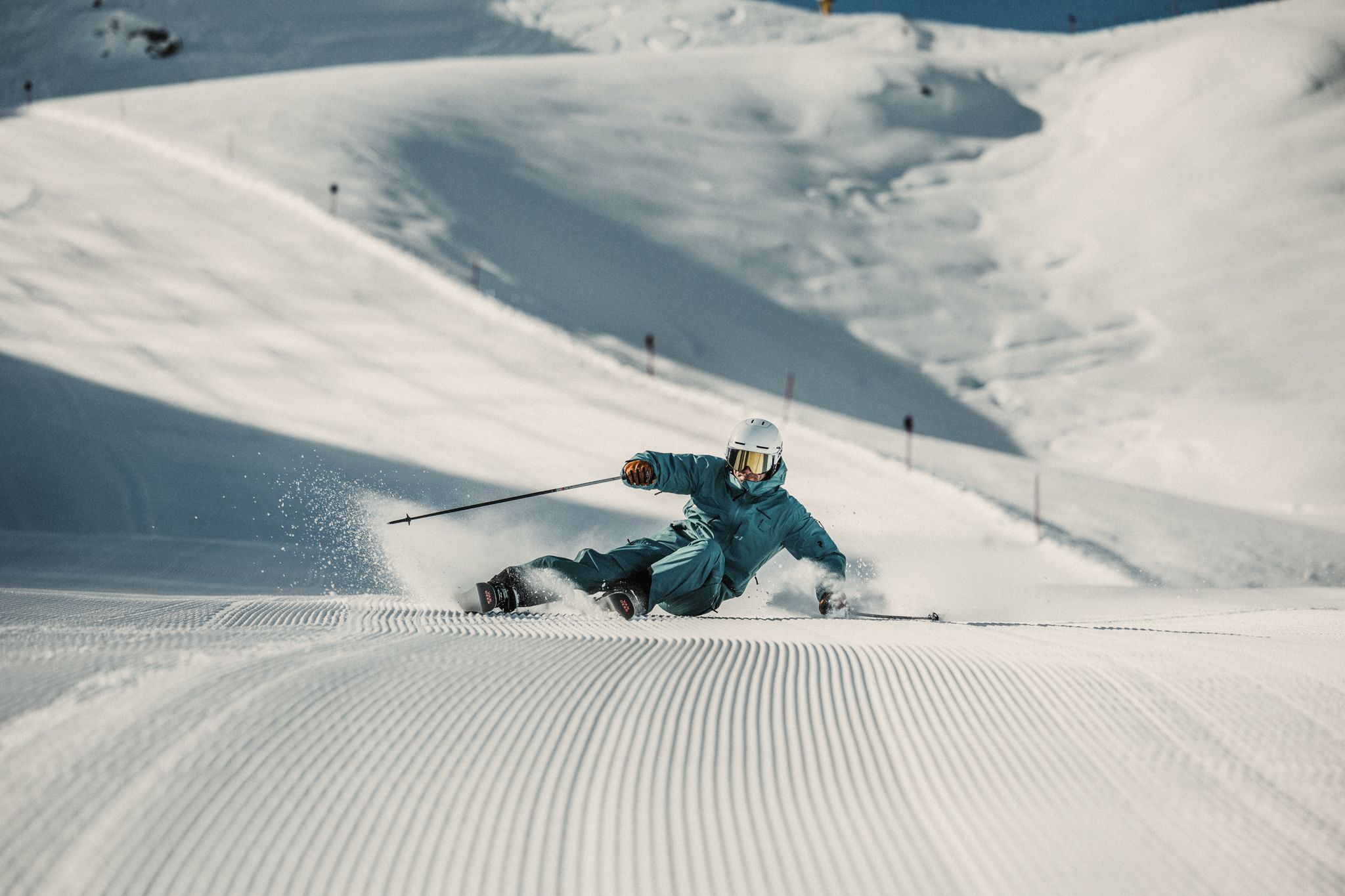 A skier enjoys the slopes of Glemmtal in perfect snow.
