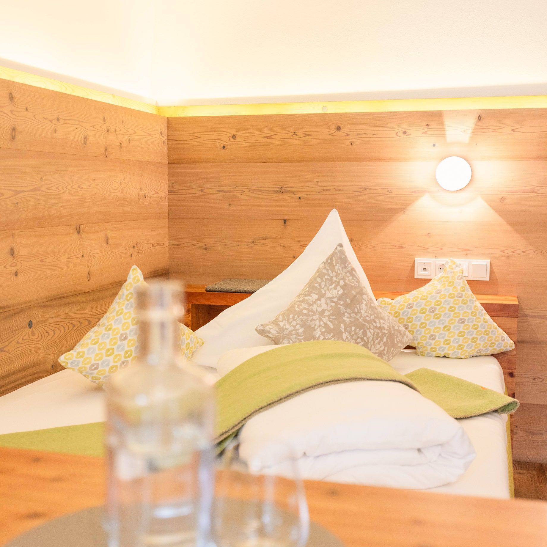 Bright and cozy bedroom at Glemmtalerhof in Hinterglemm. An ideal retreat in the Alps.