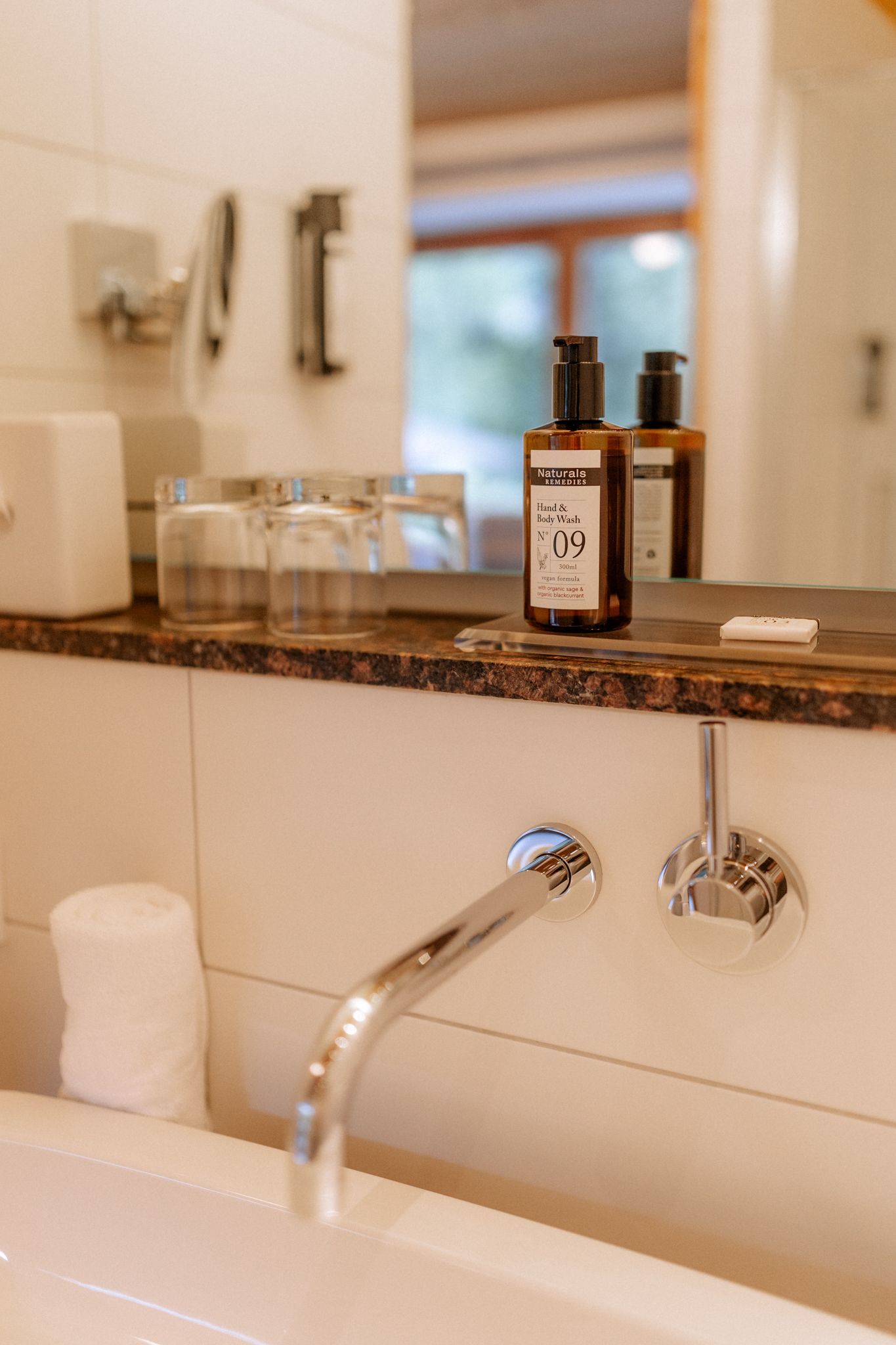 Glemmtalerhof bathroom with hand soap and towel, perfect for relaxation in the Glemmtal.