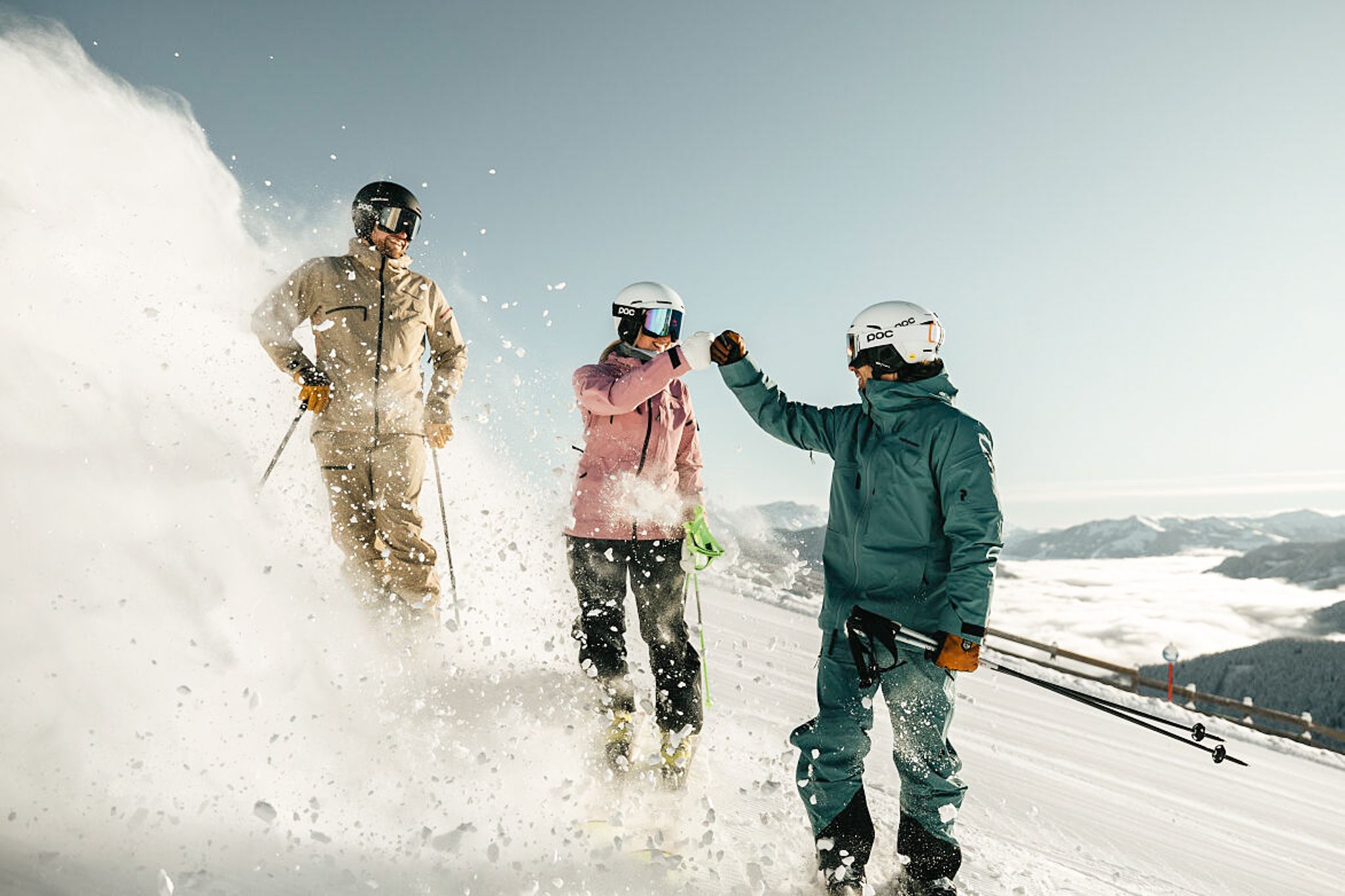 Skiers celebrate a perfect day in the snow in the Glemmtal.