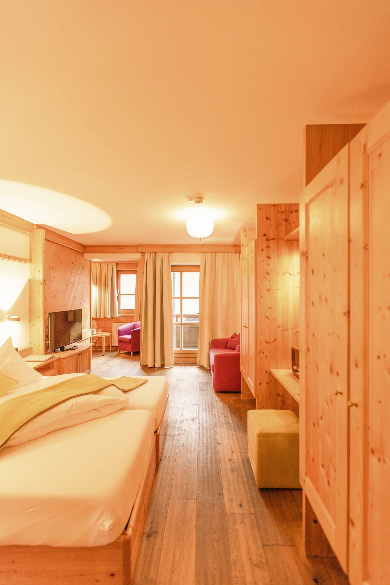 Cozy atmosphere at Glemmtalerhof in Hinterglemm with wooden interior and comfortable furnishings.